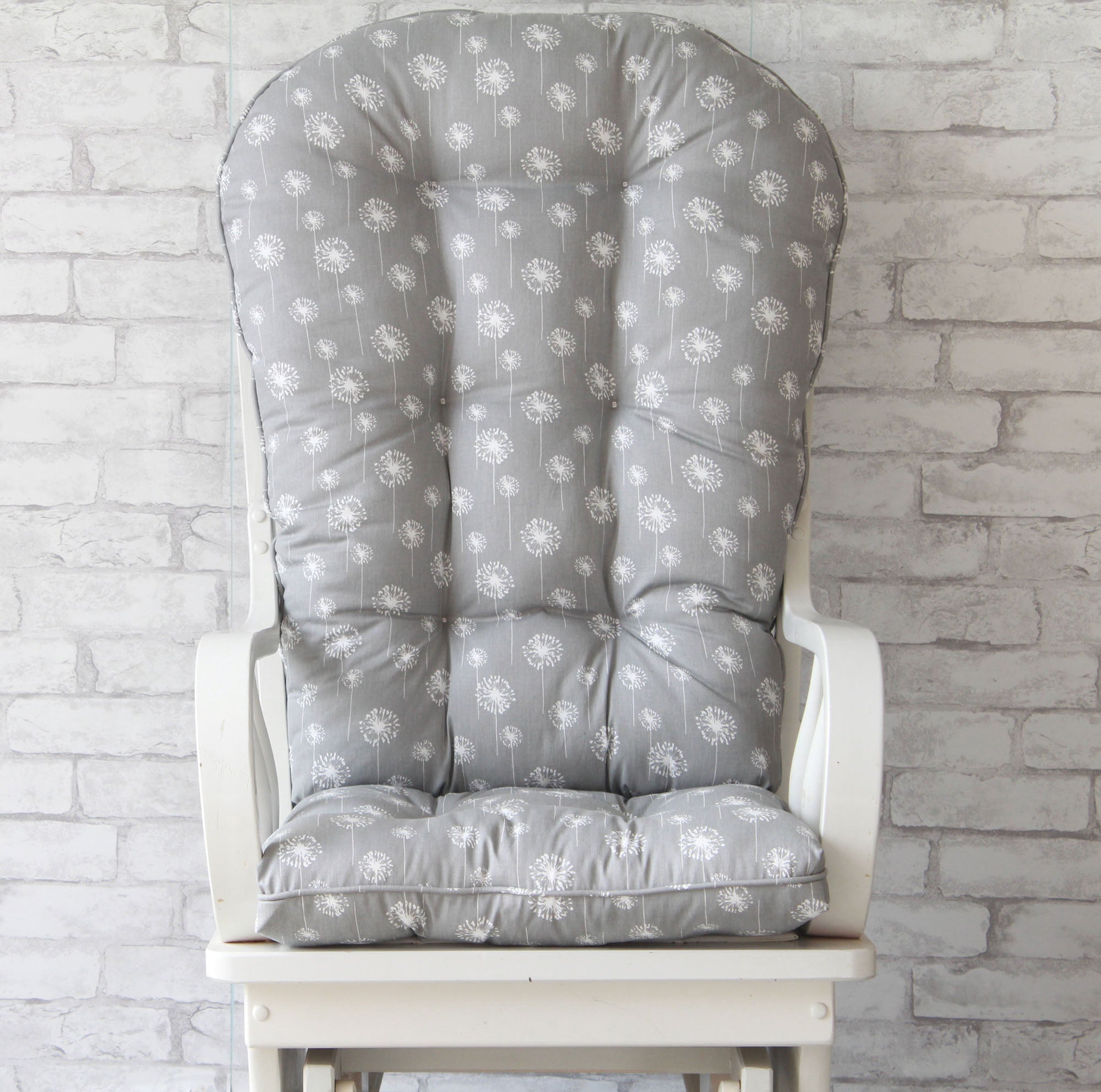 glider rocker replacement cushions made with gray upholstery fabric with white dandelions