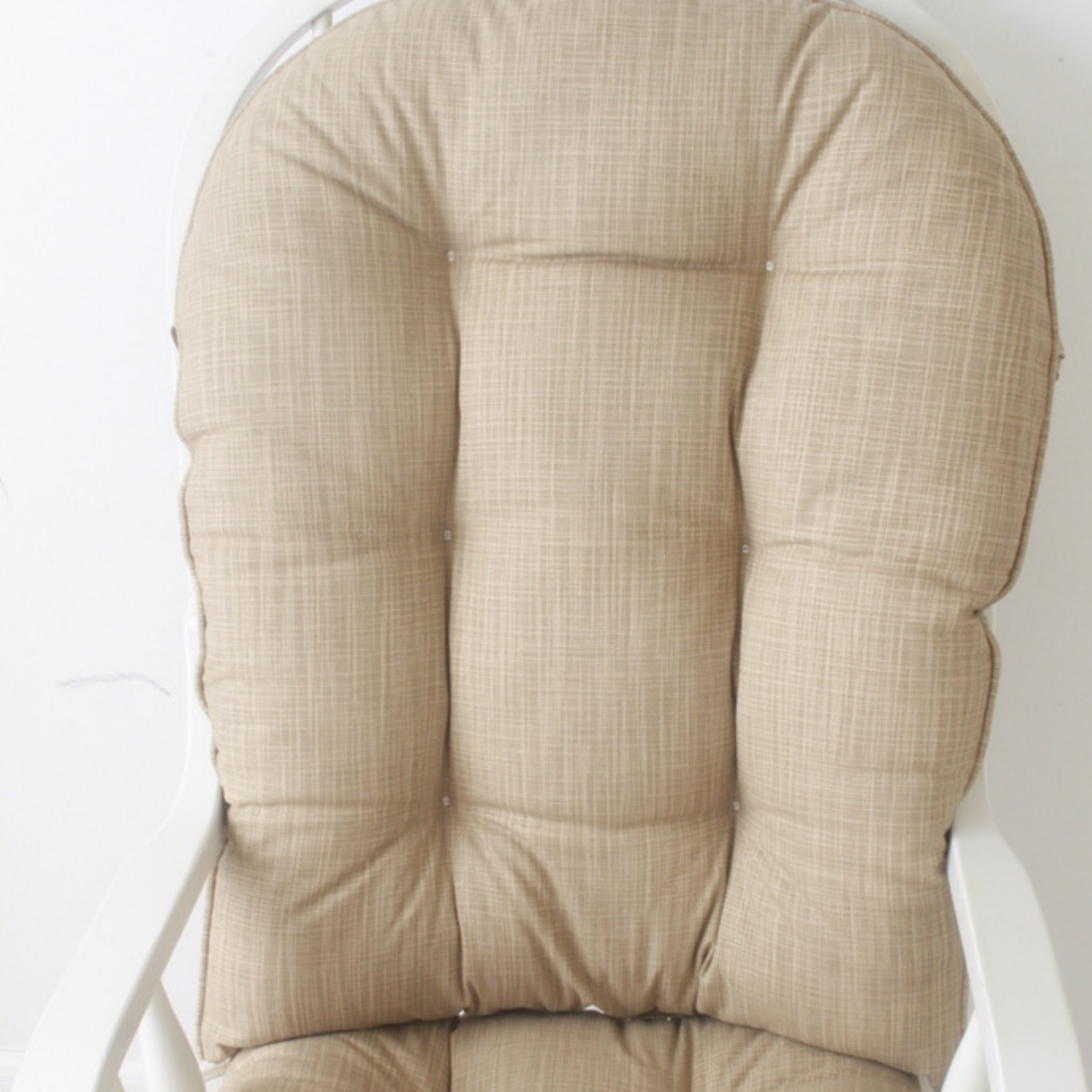 Glider replacement cushions in beige fabric on glider rocker
